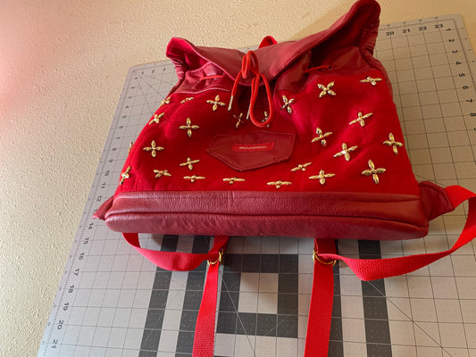 Ornate stud red backpack